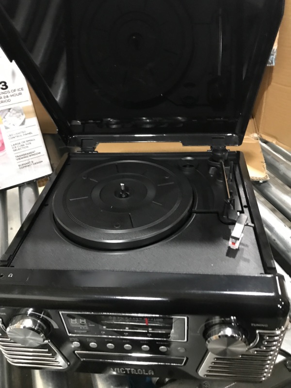 Photo 2 of does not power on ****parts only***Victrola 50's Retro Bluetooth Record Player & Multimedia Center with Built-in Speakers - 3-Speed Turntable, CD Player, AM/FM Radio | Vinyl to MP3 Recording | Wireless Music Streaming | Black Black Record Player