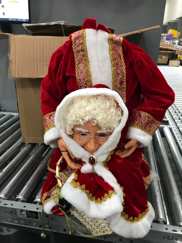 Photo 1 of Fraser Hill Farm 58-in. Dancing Mrs. Claus with Hooded Cloak and Basket | Indoor Animated Holiday Home Decor | Motion-Activated Christmas Animatronic | FAMC058D-23RED 58in Mrs Claus 4