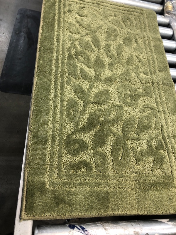 Photo 1 of 20 INCH X  34 INCH GREEN RUG  