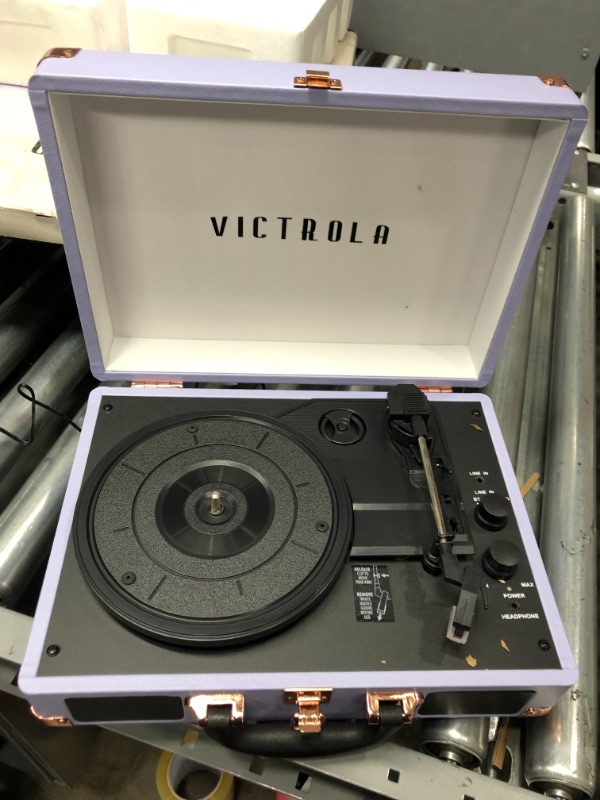 Photo 2 of DOES NOT FUNCTION, Victrola Vintage 3-Speed Bluetooth Portable Suitcase Record Player with Built-in Speakers | Upgraded Turntable Audio Sound | Lavender (VSC-550BT-LVG) Lavender/Silver Record Player
**DID NOT POWER ON**