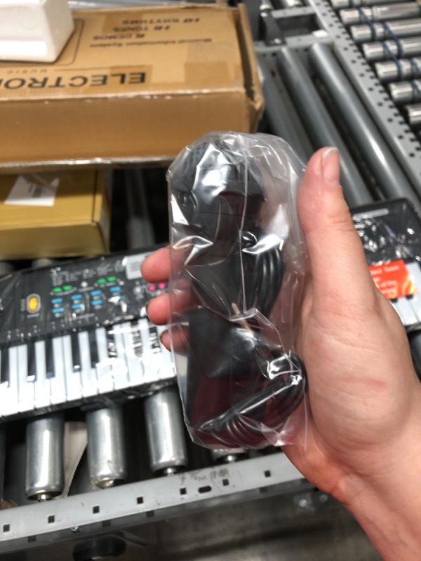 Photo 1 of ***FACTORY SEALED*** WOSTOO Keyboard Piano, 61 Key Portable Keyboard with Built-In Speaker, Microphone, Music Stand, Power Supply, Electronic Keyboard for Beginners Musical Instrument Educational Toy for Kids Boy Girl 61Keys +Stand