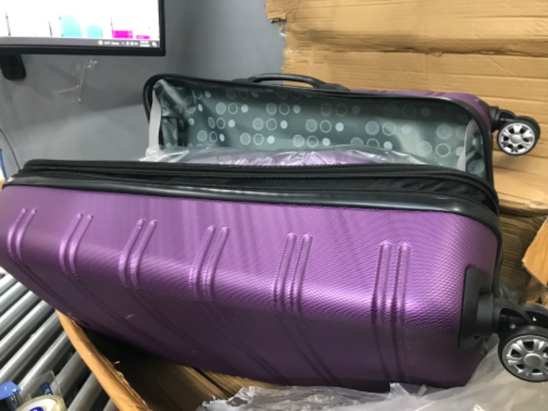 Photo 2 of *DAMAGED*- Rockland Melbourne Hardside Expandable Spinner Wheel Luggage, Purple, 2-Piece Set (20/28) 2-Piece Set (20/28) Purple