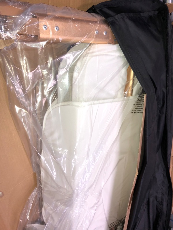 Photo 1 of Baby Bassinet, Bedside Sleeper for Baby, Easy Folding Portable Crib with Storage Basket for Newborn, Bedside Bassinet, Comfy Mattress/Travel Bag Included (White and Gold)