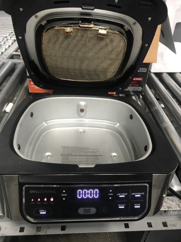 Photo 3 of Ninja Foodi 5-in-1 Indoor Grill with 4-Quart Air Fryer, Roast, Bake, Dehydrate, and Cyclonic Grilling Technology