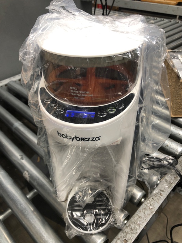 Photo 1 of New and Improved Baby Brezza Formula Pro Advanced Formula Dispenser Machine - Automatically Mix a Warm Formula Bottle Instantly - Easily Make Bottle with Automatic Powder Blending