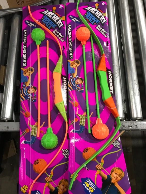 Photo 2 of Archery Dodgeball Darts, Hot new trend, 2 bows, 4 arrows, Safe in/outdoor fun with soft foam rubber head, New way to play Dodgeball - shoot at targets, Shoots up to 40’, Colors will vary 2 pack - 2 bows, 4 arrows