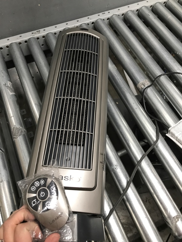 Photo 2 of *** tested- powers on*** Lasko Oscillating Digital Ceramic Tower Heater for Home with Adjustable Thermostat, Timer and Remote Control, 23 Inches, 1500W, Silver, 755320
