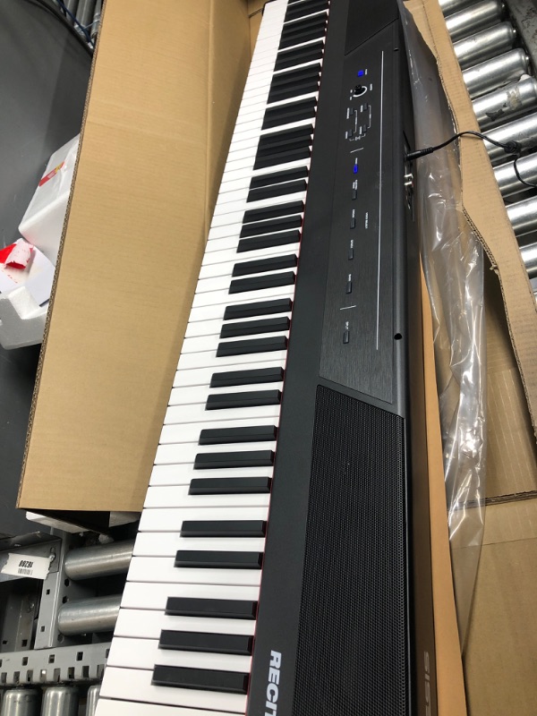 Photo 1 of Alesis Recital Pro - 88 Key Digital Piano Keyboard with Hammer Action Weighted Keys, 2x20W Speakers, 12 Voices, Record and Lesson Mode, FX and Display
