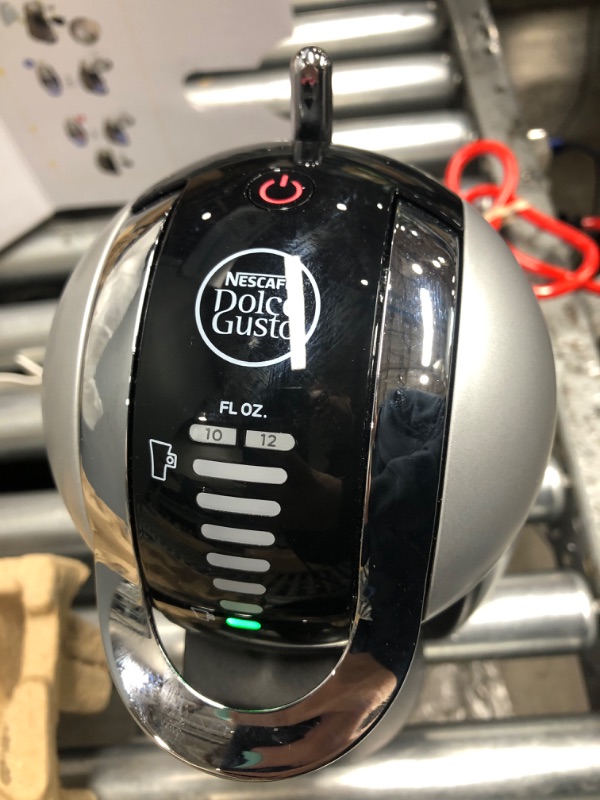 Photo 1 of *** POWERS ON ***NESCAFÉ Dolce Gusto Coffee Machine, Genio 2, Espresso, Cappuccino and Latte Pod Machine, Silver
