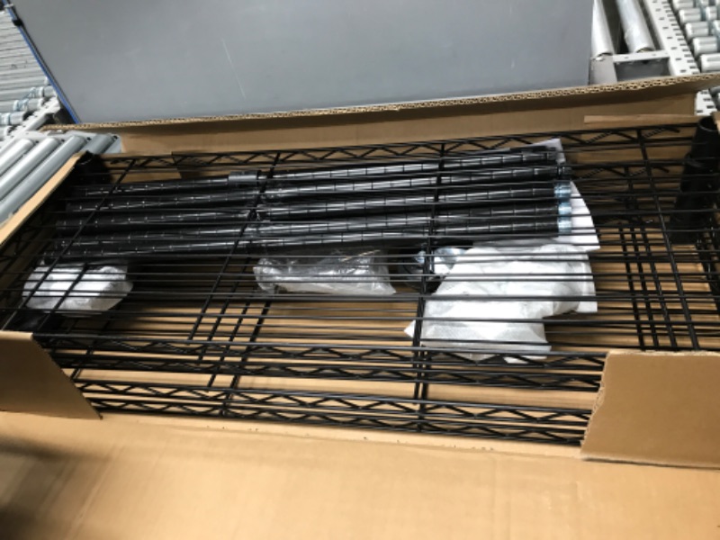 Photo 1 of AmazonBasics 4-Shelf Shelving Unit on 3'' Casters, Black