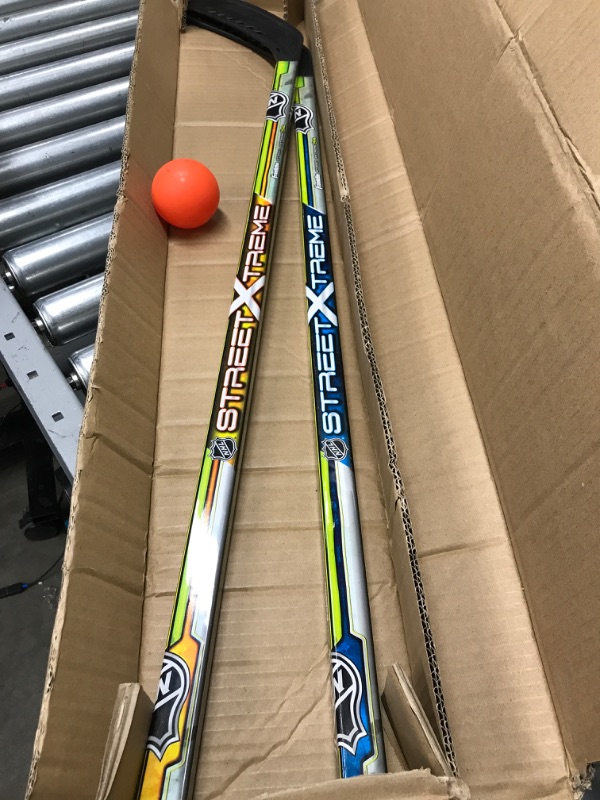 Photo 2 of Franklin Sports NHL Kids Street Hockey Stick Set - Includes (2) Youth Street Hockey Sticks + (1) Outdoor Roller Hockey Ball - Perfect Hockey Starter Set for Kids Player Sticks