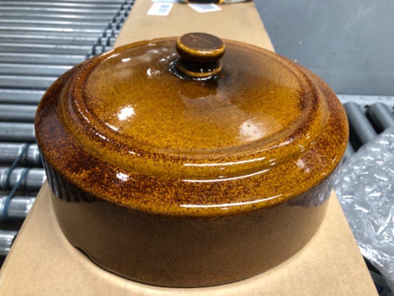 Photo 1 of brown pottery stone lid