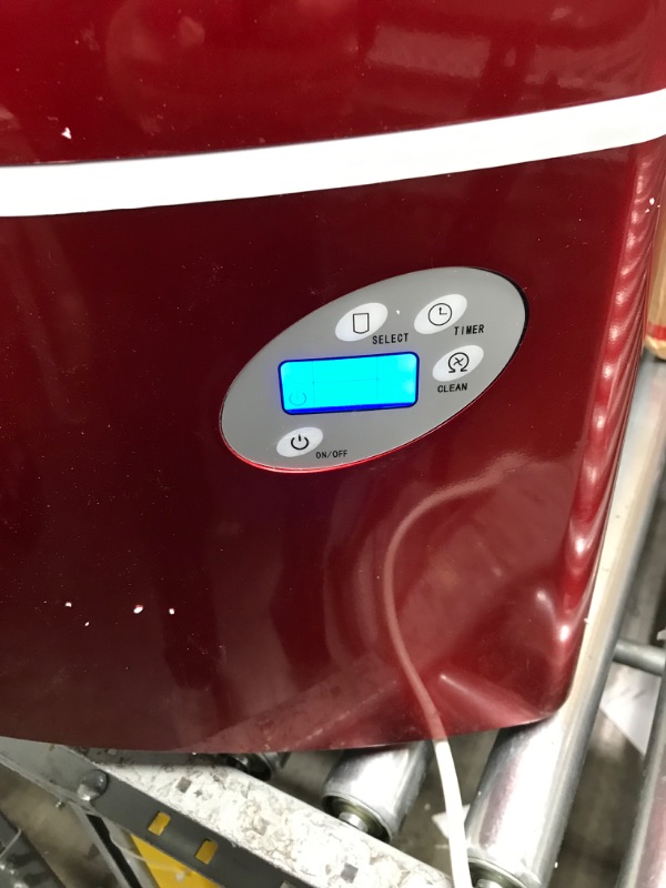 Photo 3 of NewAir Portable Ice Maker 50 lb. Daily | Red | 3 Size Bullet Shaped Ice | First Batch Under 10 Minutes | Self Cleaning Quiet Operation Countertop Ice Machine | AI-215R 
MINOR DAMAGE
