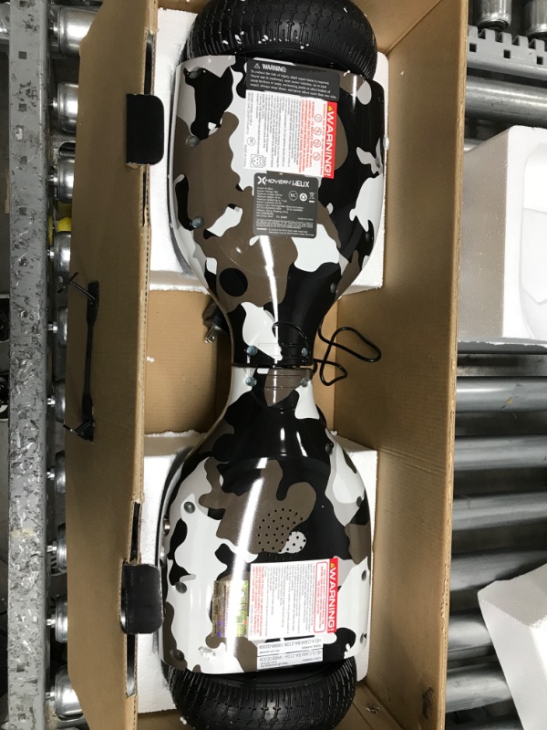 Photo 1 of *Charged for 30 mins-Didn't Power On* Hover-1 Helix Electric Hoverboard | 7MPH Top Speed, 4 Mile Range, 6HR Full-Charge, Built-in Bluetooth Speaker, Rider Modes: Beginner to Expert
