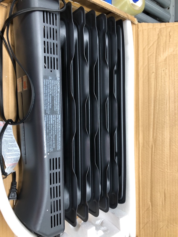 Photo 2 of *** DENT *** Amazon Basics Portable Digital Radiator Heater with 7 Wavy Fins and Remote Control, Black, 1500W Digital Control