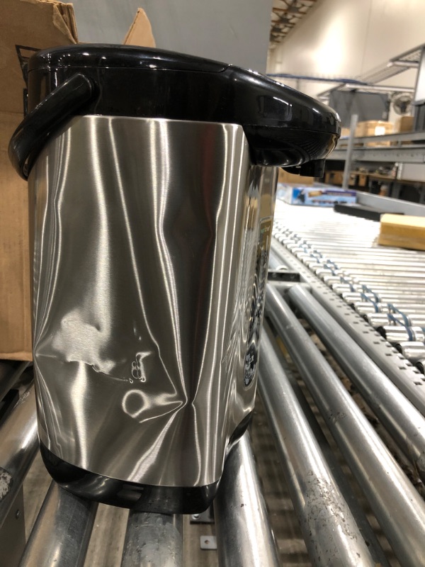 Photo 3 of **** Big dent on both sides****
****small dent on front****
**** No power cord****
**** unable to test****
rNutriChef Hot Water Urn Pot Insulated Stainless Steel,Auto & Manual Dispense,Auto Boiler,Safety Lock Shutoff 3.38 QT /3.2L - Auto Boiler Shut Off -