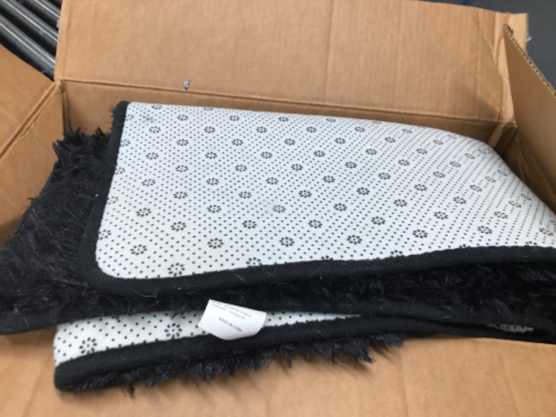 Photo 1 of 2'x4' black bathroom mat 