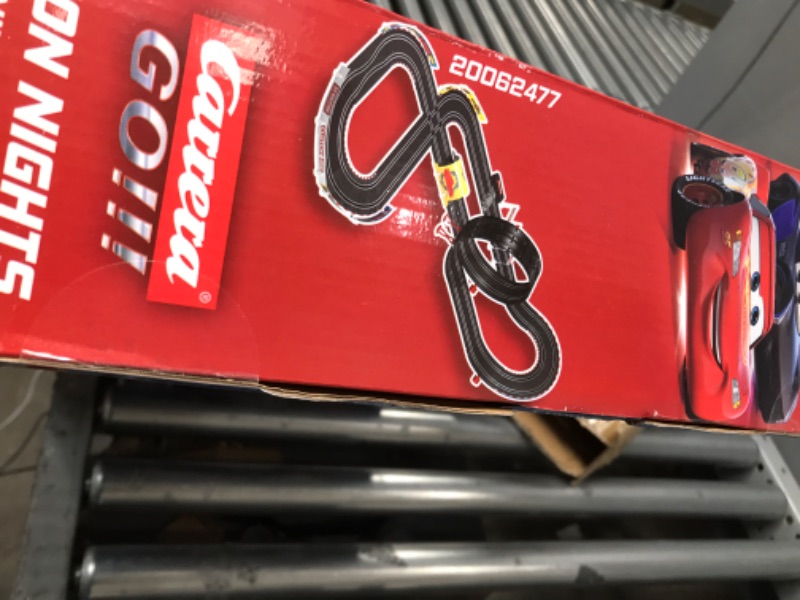 Photo 1 of Carrera GO!!! 62477 Disney Pixar Cars Neon Nights Electric Slot Car Racing Kids Toy Race Track Set Includes 2 Controllers and 2 Cars in 1:43 Scale Disney Cars Neon