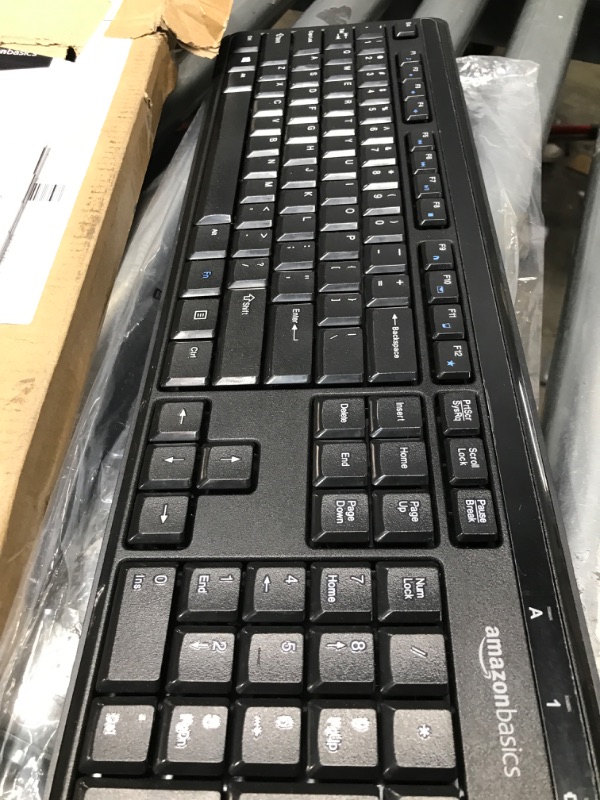 Photo 3 of Amazon Basics Wireless Computer Keyboard and Mouse Combo - Quiet and Compact - US Layout (QWERTY)