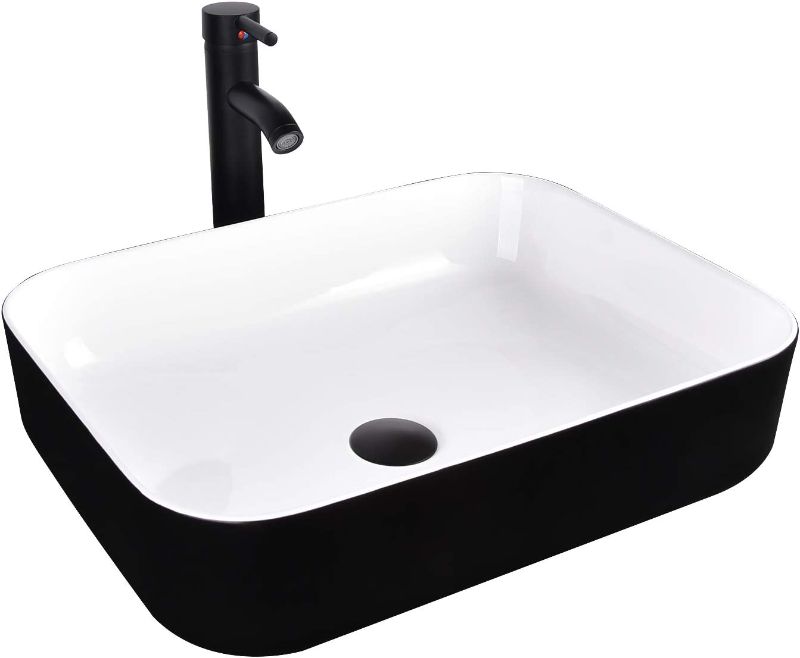 Photo 1 of Black and White Ceramic Bathroom Sink, 19" x 15" Above Counter Porcelain Vessel Sink with Black Faucet and Pop up drain Combo, Rectangle