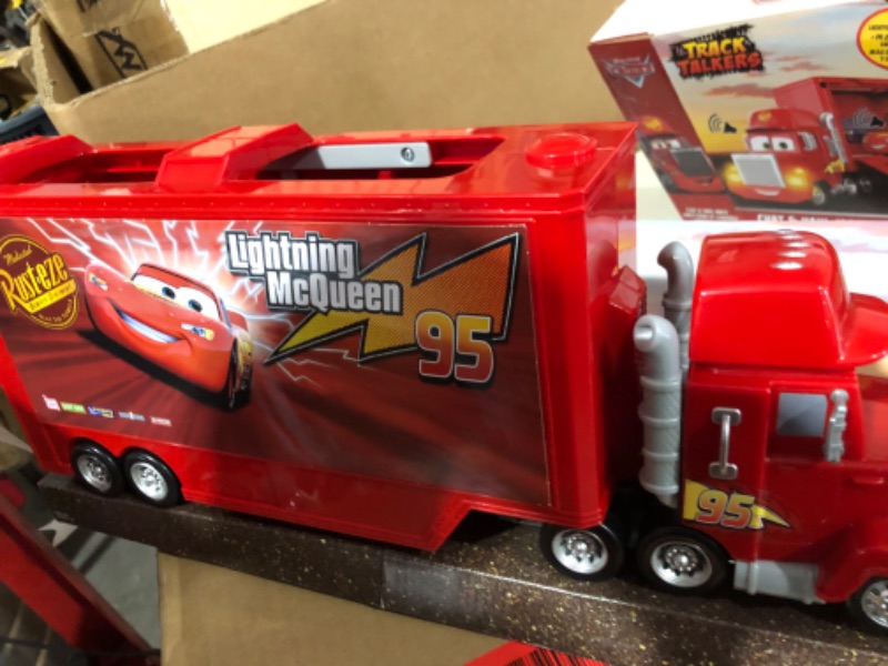 Photo 3 of Disney Car Toys Track Talkers Toy Truck, Chat & Haul Mack Hauler with Lights & Sound, Stores 2 Cars, 17 Inch Simplified Packaging