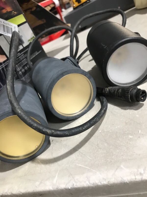 Photo 2 of * 2 lights dont work * sold for parts/repair * 
Philips Hue Lily White & Color Outdoor Spot Light Base kit (Hue Hub Required), 3 Spot Lights with Power Supply