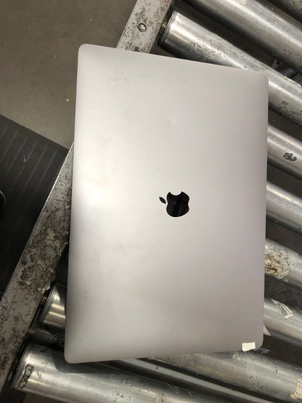 Photo 2 of **DAMAGED**Apple 2019 MacBook Pro (16-inch, 16GB RAM, 512GB Storage, 2.6GHz Intel Core i7) - Space Gray
