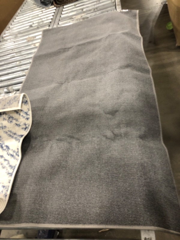 Photo 1 of 2ft 7in x 10ft runner rug grey