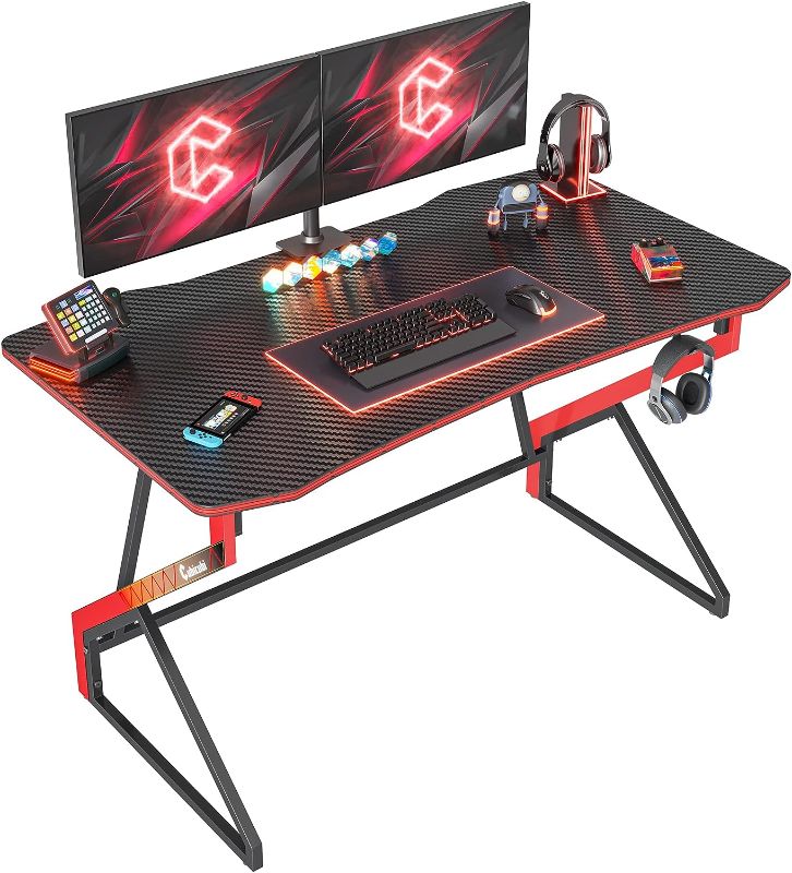 Photo 1 of 
CubiCubi Simple Gaming Desk Z Shaped 40 inch Gamer Workstation, Home Computer Carbon Fiber Surface Gaming Desk PC Table with Headphone Hook
Size:47 Inch
Color:Black
