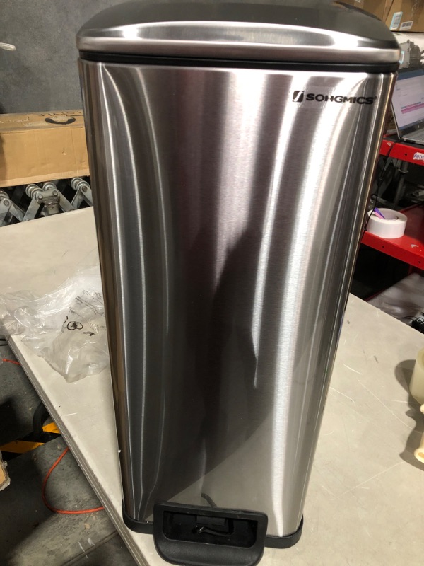 Photo 2 of * broken pedal * dented lid * 
SONGMICS Slim Trash Can, 12.7 Gallon Garbage Can for Narrow Spaces with Soft-Close Lid,