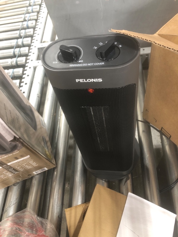 Photo 1 of PELONIS PTH15A2BGB 1500W Fast Heating Space Heater, Programmable Thermostat, Easy Control, Widespread Oscillation, Over Heating & Tip-over Switch Protection, 7.72 x 7.72 x 17.76 Inches, Gray , Grey