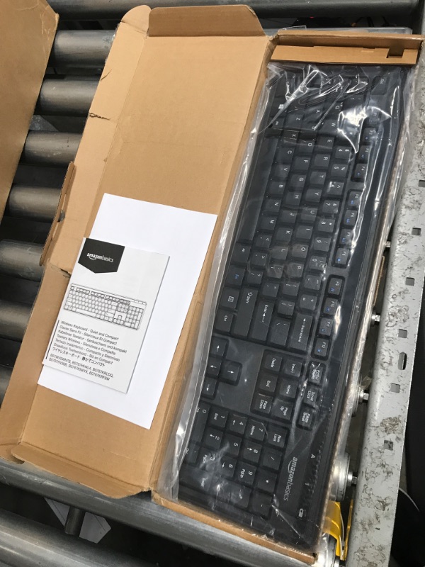 Photo 2 of Amazon Basics Wireless Keyboard-Quiet and Compact-US Layout (QWERTY)