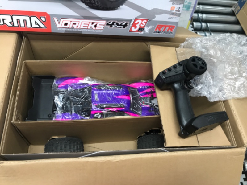 Photo 2 of *PARTS ONLY DOES NOT FUNCTION*
ARRMA RC Truck 1/10 VORTEKS 4X4 3S BLX Stadium Truck RTR, Purple, ARA4305V3T2