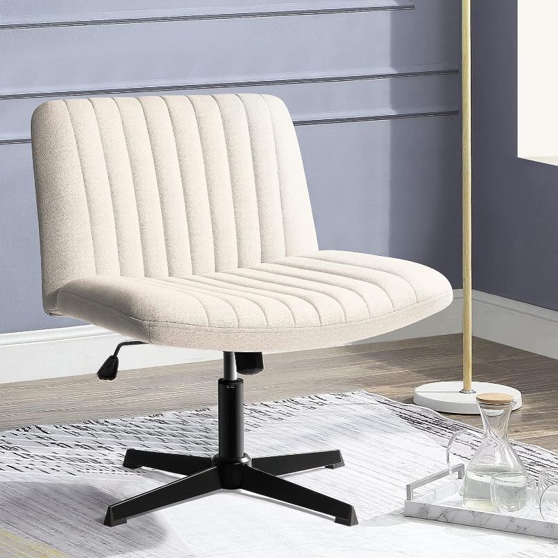 Photo 1 of 
PUKAMI Armless Office Desk Chair No Wheels,Fabric Padded Modern Swivel,Height Adjustable Wide Seat Computer Task Vanity Chair for Home Office,Mid Back...
Color:Beige