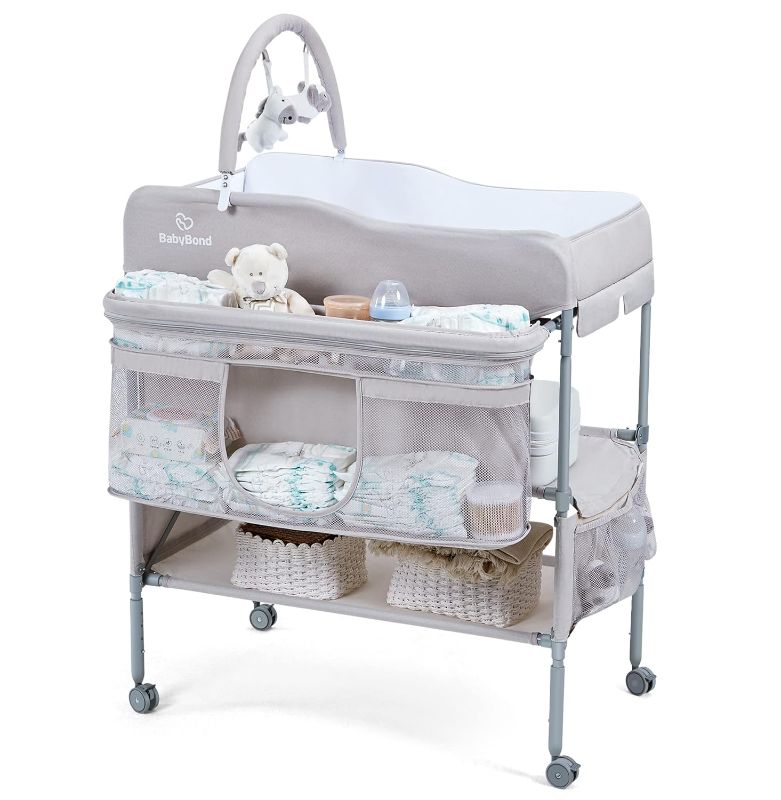 Photo 1 of 
BabyBond Portable Baby Changing Table, Foldable Changing Table Dresser Changing Station for Infant, Waterproof Diaper Changing Table Pad Topper, Mobile...
