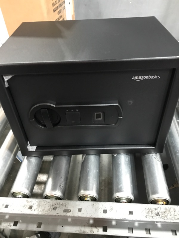 Photo 1 of Amazon Basics Steel Security Safe with Programmable Biometric Fingerprint Lock - Secure Cash, Jewelry, ID Documents - 0.5 Cubic Feet, 13.8 x 9.8 x 9.8 inches 0.5 Cubic Feet Fingerprint Lock
