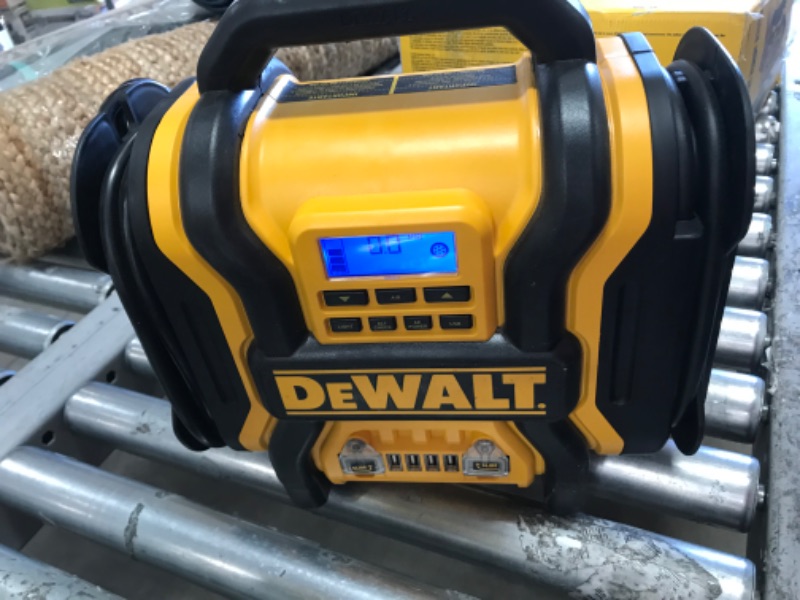 Photo 2 of DEWALT DXAEPS14 1600 Peak Battery Amp 12V Automotive Jump Starter/Power Station with 500 Watt AC Power Inverter, 120 PSI Digital Compressor, and USB Power , Yellow