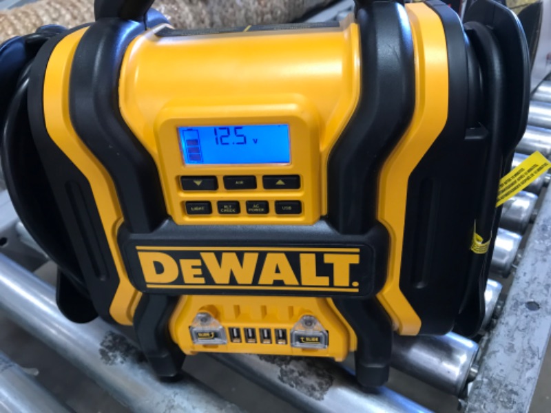 Photo 2 of DEWALT DXAEPS14 1600 Peak Battery Amp 12V Automotive Jump Starter/Power Station with 500 Watt AC Power Inverter, 120 PSI Digital Compressor, and USB Power , Yellow