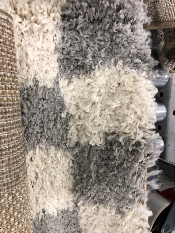 Photo 1 of 6ft Shaggy gray and white checkered rug 