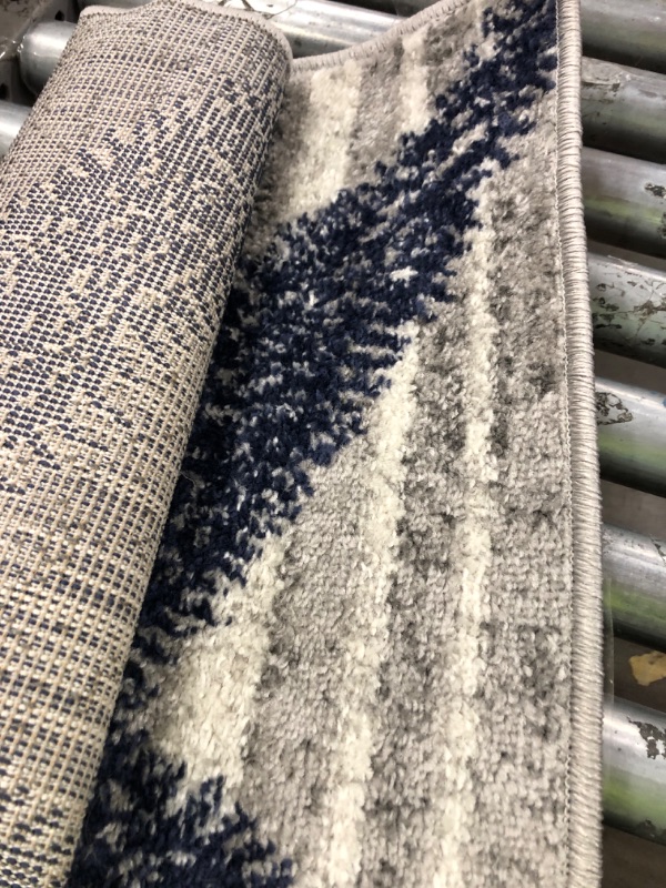 Photo 1 of 2'3ft x 3'10" blue  and gray patterned rug 