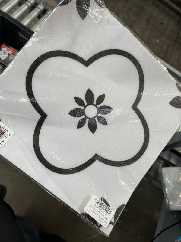 Photo 2 of * used item * bent *
Dureidos Peel and Stick Floor Tile, Black and White Flower Vinyl Flooring, Self Adhesive, 