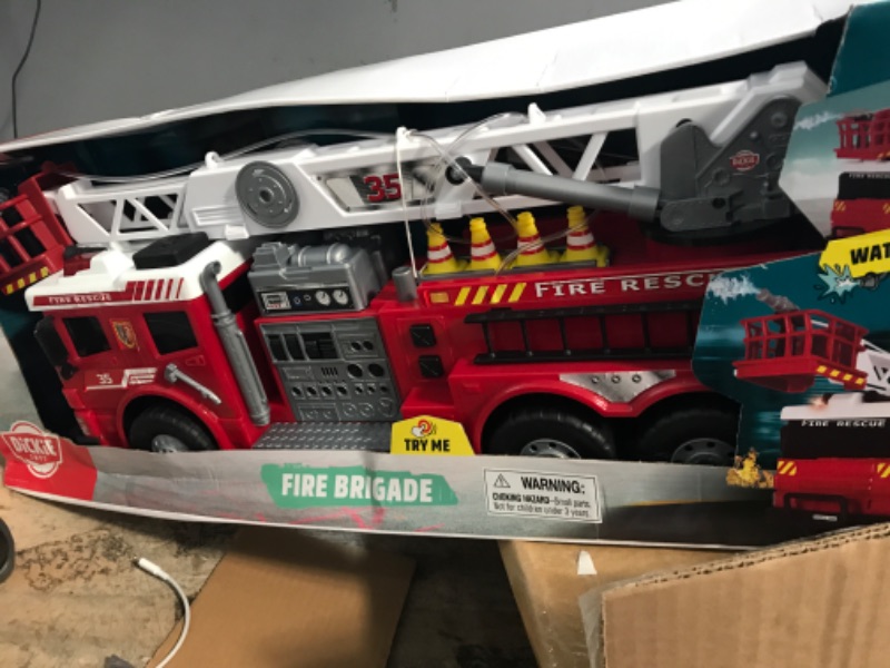 Photo 2 of * used * missing some pieces * functional * 
Dickie Toys: 24" Light and Sound Fire Brigade Vehicle (With Working Pump), Ladder Rotates by 350 Degrees