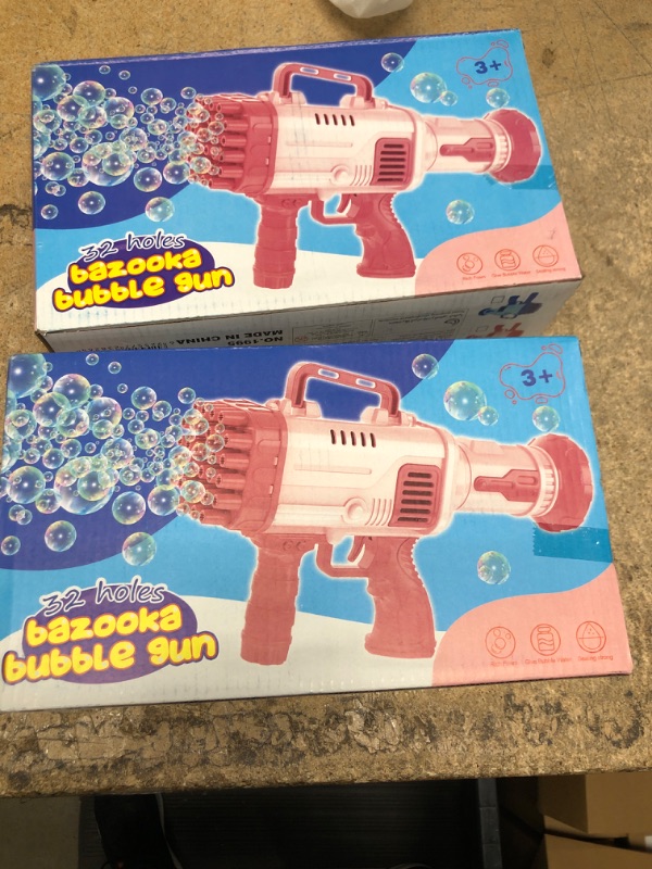 Photo 1 of bundle of 2 bubble guns