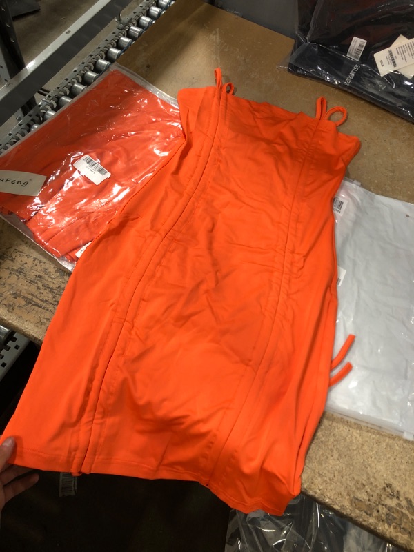 Photo 1 of  small orange tight dress 