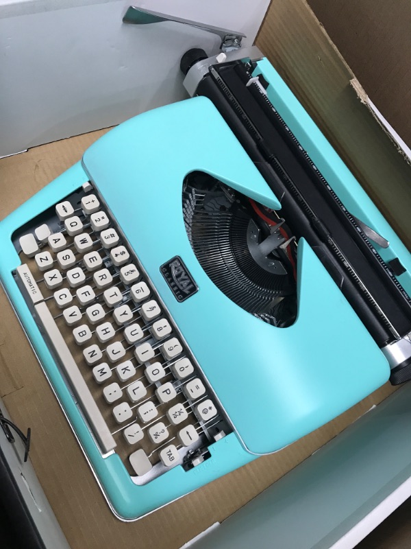 Photo 3 of Royal 79101T Classic Manual Typewriter (Mint Green)