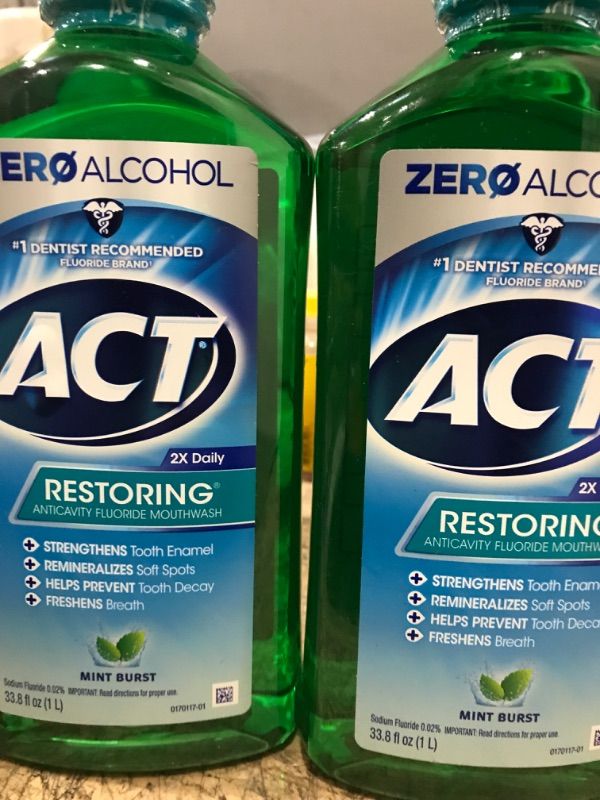 Photo 2 of 2 ACT Restoring Zero Alcohol Fluoride Mouthwash 33.8 fl. oz. Strengthens Tooth Enamel, Mint Burst Green 33.8 Fl Oz (Pack of 2)