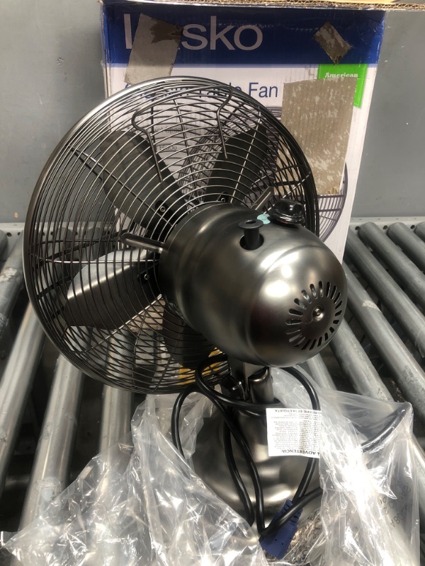 Photo 2 of Lasko 12" Classic Metal Table Fan - 12" Diameter - 3 Speed - Quiet, Carrying Handle, Oscillating - 17.3" Height x 13.3" Width - Metal