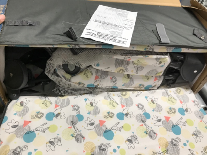 Photo 2 of *MINOR DAMAGE-MISSING CARRYING CASE*
Graco Pack and Play Portable Playard, Push Button Compact Fold, Carnival Portable Playard 