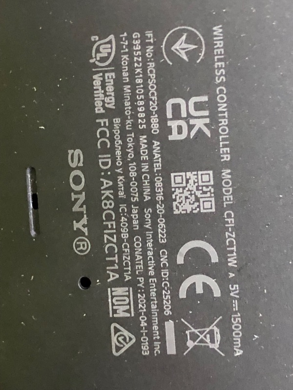 Photo 8 of SCRATCHED; PlayStation 5 Console THIS IS NOT THE AMAZON LISTED BUNDLE; THEREFORE, THE PACKAGE DOES NOT INCLUDE "VAUCHER FOR A DIGITAL COPY OF THE STANDARD EDITION OF THE GAME." PACKAGE ONLY INCLUDES CONSOLE, REMOTE, BASE, AND POWER CORDS. 