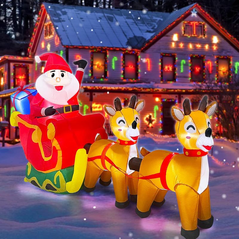 Photo 1 of *SIMILAR TO STOCK PHOTO**- 10 Ft long christmas inflatable santa on sleigh with reindeer